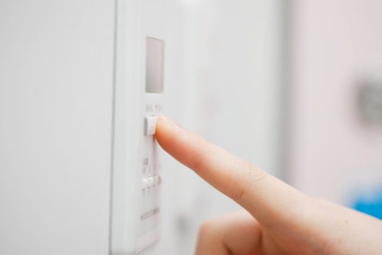 4 Signs Your Thermostat Needs Replacement Pinellas   VIGILANT Pressing A Button On Thermostat Shutterstock 307594151 E1572267652718 1 768x513 