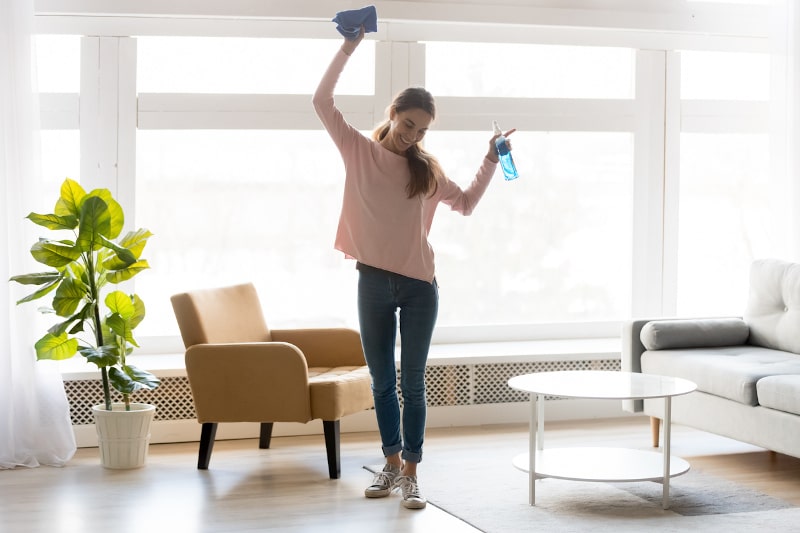 woman celebrating a clean home